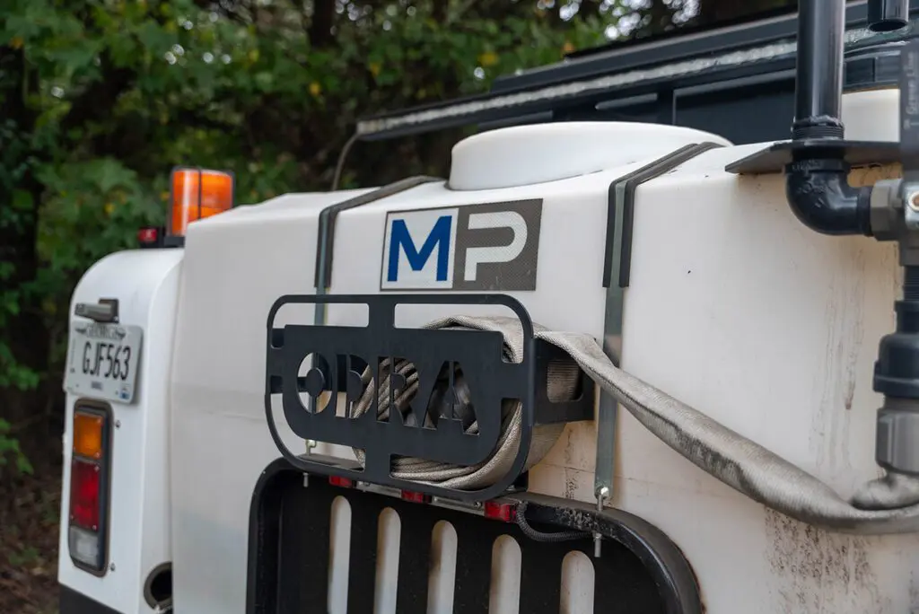 front of a magnum paving truck