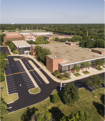 aerial view of a school and a parking lot