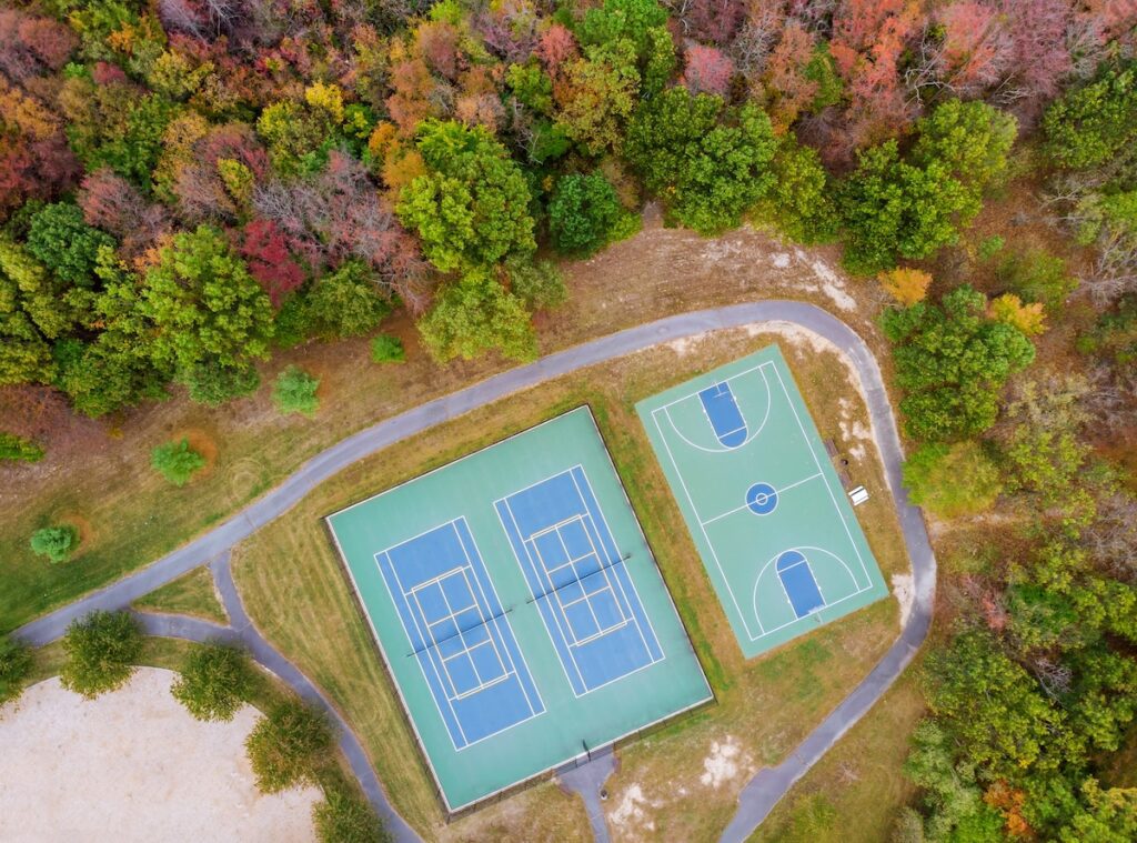 Sports ground a height basketball and tennis playing field autumn landscape view