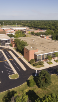 aerial view of a school and a parking lot