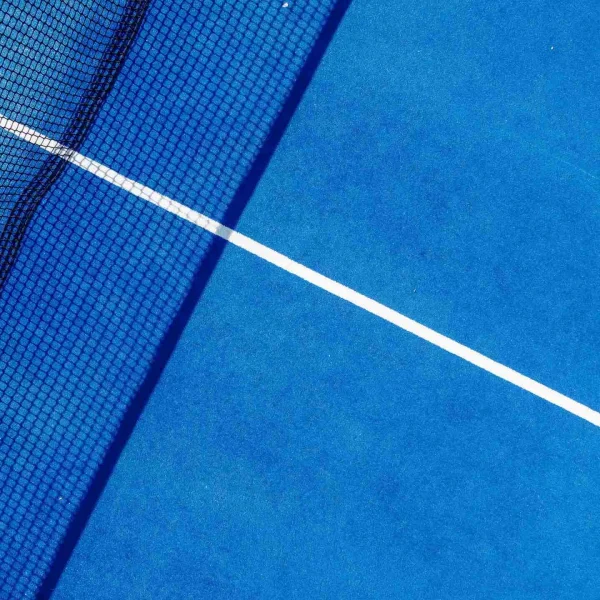 aerial view of a blue tennis court
